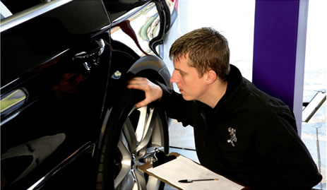 Which parts of the tyre are checked during an MOT?